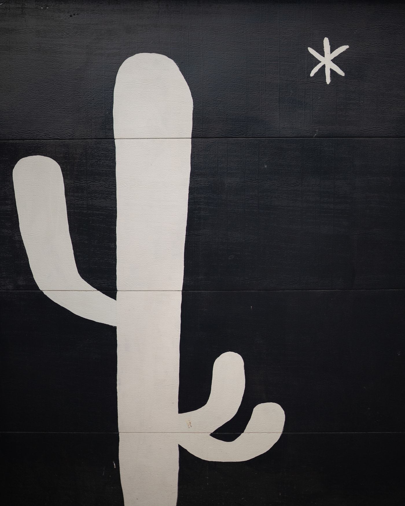 Mural en blanco y negro en Alamo Motel